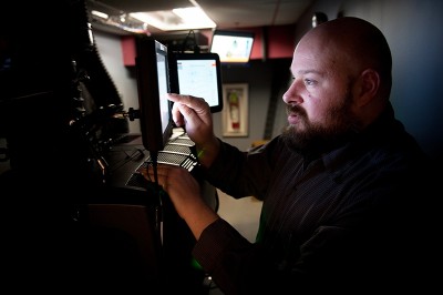 SLFS's Lance Walker enjoys the more carefree, digital format of projecting films. 