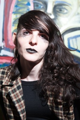 Aisling Spector, who identifies as agender and femme, is a writer who runs an online support community, the Queer Cyborg Collective, for members of the trans* community, and is preparing to pursue writing school in Oregon. 