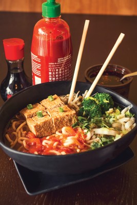 Soup with la mein, tofu, broccoli, cabbage, sprouts and tomato broth is one of many hearty noodle combinations at CY Noodles House. Photo: Talyn Sherer