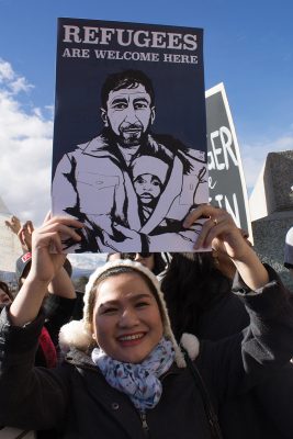 On Feb. 4, 2017, Elve Na stands in solidarity with refugees at the Utah March for Refugees—a population whom the Journey to the Wasatch event benefits. Photo: Amy Meyer