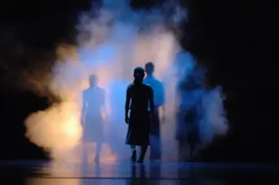 Ririe-Woodbury Dance Company performing Surfaces on smoky stage