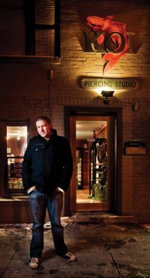 KOI owner Curt Warren stands outside of the shop. 