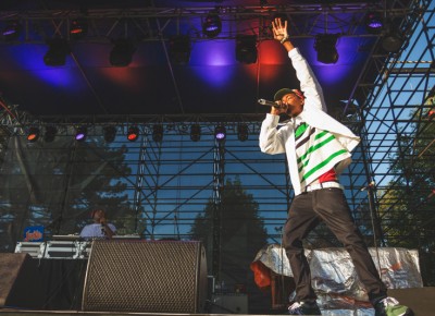 Bishop Nehru gives the crowd a hand as they rap alongside him throughout his set.
