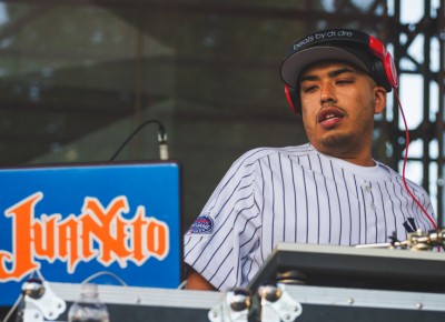 DJ Juanito reps the New York Pride in through all his swag.