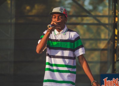 Bishop Nehru glances at the camera for a brief moment as his set comes to an end.