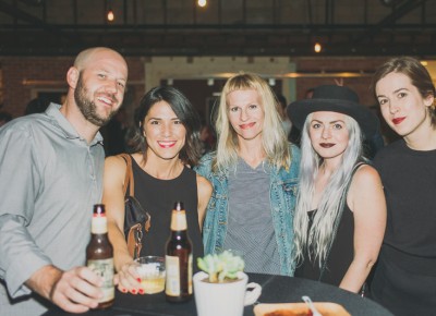 (L-R) Elwood and Leah Hullinger, Nicole Warner, Valori Boss and Eleanor Kramer gathered around one of the many standing tables in Publik's event space. Photo: @clancycoop