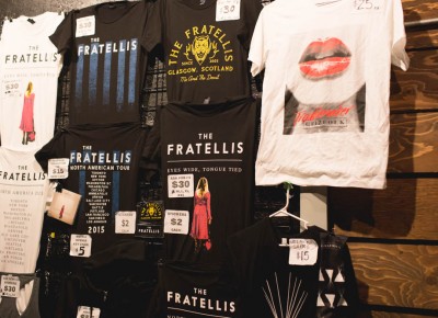 Merchandise for the Fratelli's North America Tour up for sale by the door.