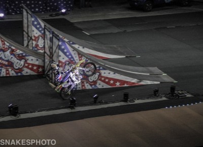 Travis Pastrana wheeling to the start gate for more carnage. Photo: Jake Vivori