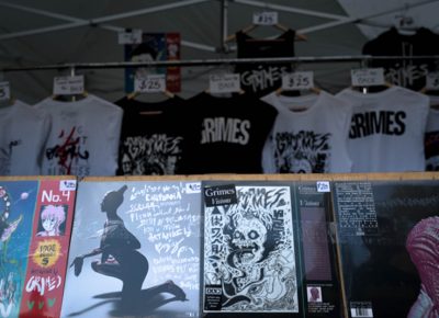 Grimes’ art adorned her shirts and album covers at the merch tent. Photo: JoSavagePhotography.com