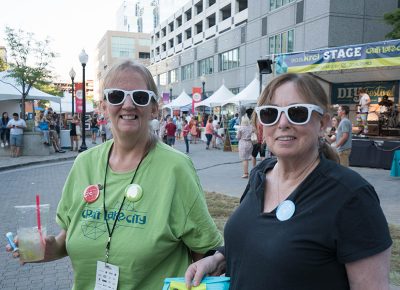 After a photo booth session at the Google booth, Martie Goodrich and Charlotte Erickson enjoyed some live music at the KRCL Stage. Photo: JoSavagePhotography.com