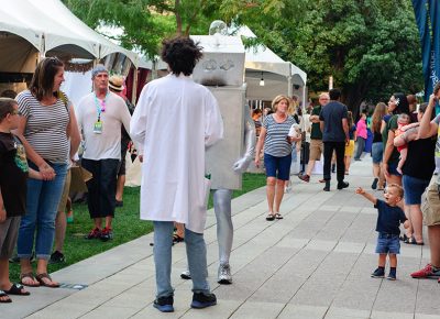 A child is impressed by the robot that made rounds throughout DIY Fest. Photo: @snowlenda