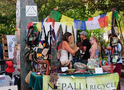 Anagela Chacon shows off goods from Beni Nepal. The items are made from recycled materials and imported from Nepal. Photo: @snowlenda