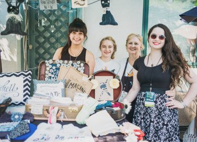 (L–R) Victoria, Isabella, Marcea and Katrina Flores having fun at their booth Black Rabbit Arts. Photo: @clancycoop