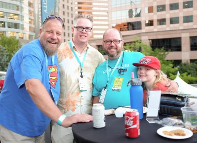 (L–R) Max Reikhof, Robert Martin, Barton Moody and Cooper enjoy a lovely August evening on the Craft Lake City VIP Patio. Photo: John Barkiple