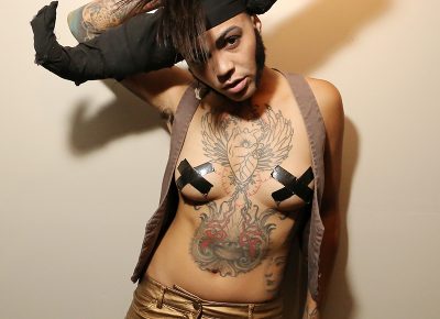 Onstage, Loke acts as a spiritual charging dock in drag for show-goers. Photo: ThatGuyGil