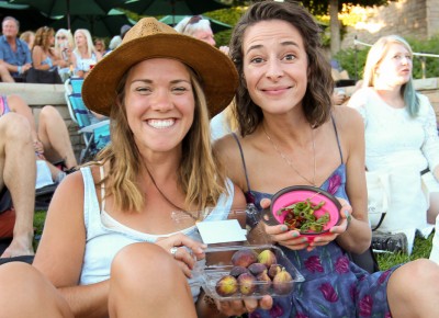 (L–R) Kellan Warner and Havelah Weinhardt came to see Gregory Alan Isakov, but they’ll stay for Lake Street Dive. “My sister played This Empty Northern Hemisphere [Isakov’s album from 2009] nonstop for three weeks while I was living with her. It’s fantastic,” she says. They’re dining on figs and an arugula and tomato salad dressed with olive oil. Photo: John Barkiple