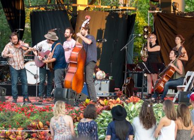 Gregory Alan Isakov’s band usually includes Jeb Bows on violin, Philip Parker on cello, Steve Varney on banjo and guitar, Max Barcelow on drums, John Grigsby on bass and James Han on piano. Tonight, he added a French horn, another violin and a cello to the mix. Photo: John Barkiple