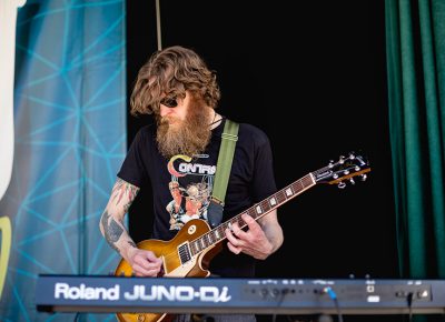 Bass/Keyboardist Ben Johnson of the Statuettes playing on the SLUG Magazine Main Stage at DIY Fest 2016. Photo: @LMSorenson