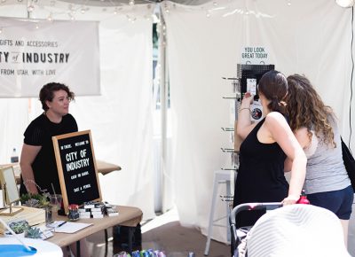 Folks checking out some stylish earrings at the City of Industry tent at the DIY Fest. Photo: @LMSorenson