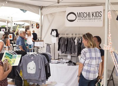 Mochi Kids clothing items being perused by guests of DIY Fest. Photo: @LMSorenson