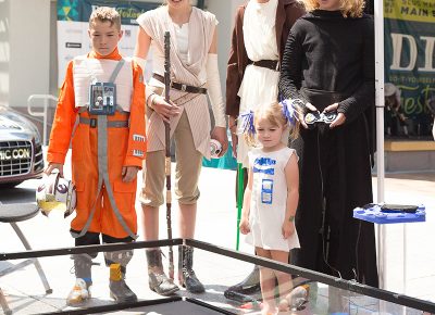 Young cosplyers take their turn at the custom-made remote control cars. Photo: @LMSorenson