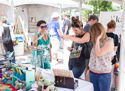 A shopper admires her potential purchase. Photo: @LMSorenson