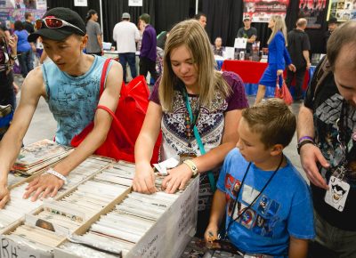 Obviously, comic books are what some people actually come to Salt Lake Comic Con for. These folks are finding their selections in the boxes at Gweedo's Comic. Photo: @Lmsorenson