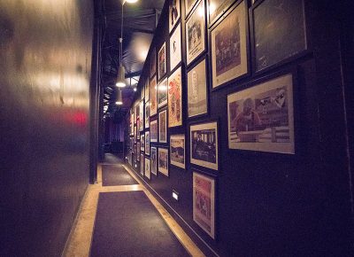 Some people might call this a hallway, but I call it a corridor. It leads to the stage and is filled with past State Room show posters. Photo: JoSavagePhotography.com
