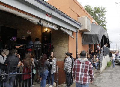 Fans line up in the rain as they wait for doors to open for Tegan and Sara at In The Venue. Photo: @Lmsorenson