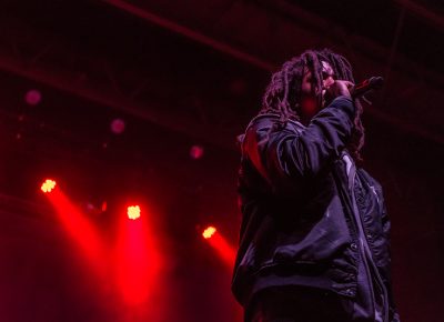 DeM Atlas stands tall in front of a sold out Salt Lake City Crowd. Photo: ColtonMarsalaPhotography.com