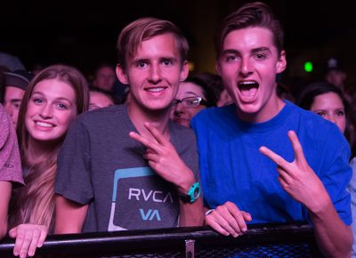 Samantha, Chandler and Josh hold down a front row spot for Atmosphere. Photo: ColtonMarsalaPhotography.com