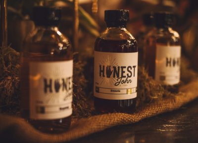 Aromatic bitters rest on a burlap sack with some wood moss filling to the edge. Photo: Talyn Sherer