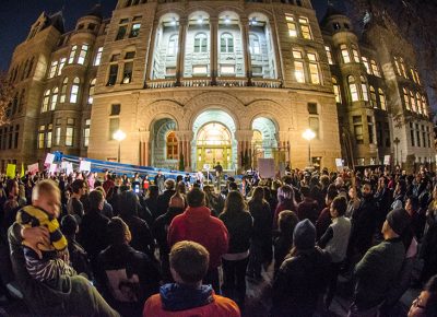 A large crowd gathers in solidarity to determine the next steps to move forward. Photo: Dave Brewer & Gabe Mejia // Photo Collective Studios