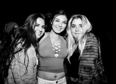 (L–R) Mallory, Toni and Haylie pose for a quick picture while Zipper Club set up. Photo: Gilbert Cisneros