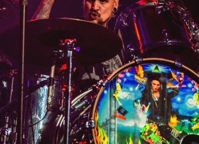Jeremy Colson brought out the big guns as he wrecked up the acoustic drums while performing with Steve Vai. Photo: Talyn Sherer
