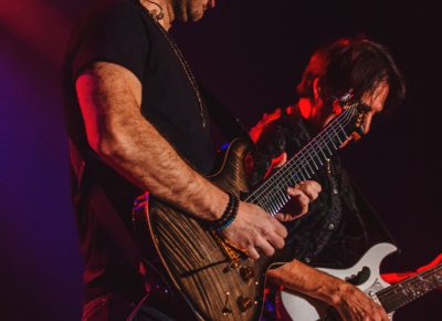 Dave Weiner performs alongside rock god Steve Vai. Photo: Talyn Sherer