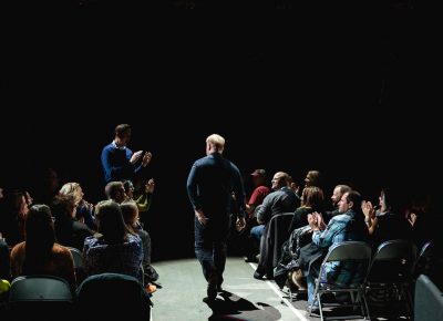 Fans clap, stand and scream at the comedian as he walks past. Photo: Lmsorenson.net