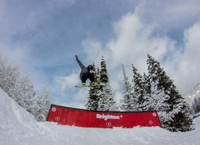 Spencer Dallas 2nd Place 17 & under mens snow flying off the jump. Photo CJ Anderson