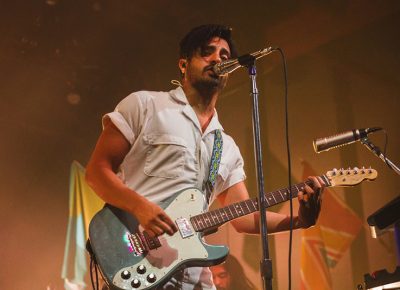 Sameer Gadhia of Young the Giant shoots a quick glance to the crowd as they sing along with every note. Photo: Talyn Sherer.