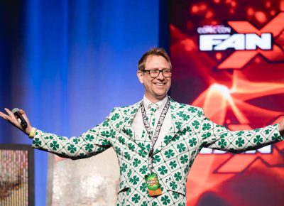 Host Chris Provost sporting a shiny new St. Patrick's Day jacket while kicking off the festivities in the Grand Ballroom. Photo: Lmsorenson.net
