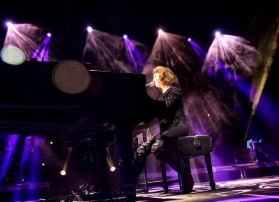 Regina Spektor playing piano center stage at The Saltair. Photo: Lmsorenson.net