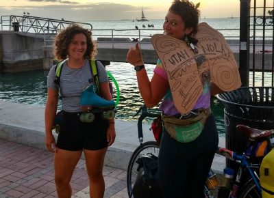 Holly Miller (left), another solo female biker, took a break from bicycling and roller skated the length of the Florida Keys. Arrival at Key West at sunset on the same day. Photo courtesy of Erika Longino.