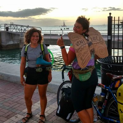 Holly Miller (left), another solo female biker, took a break from bicycling and roller skated the length of the Florida Keys. Arrival at Key West at sunset on the same day. Photo courtesy of Erika Longino.