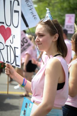 Claire Love marches in the Utah Pride Center’s 2017 Pride Parade. Photo: John Barkiple