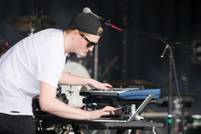 Keyboardist for RKDN playing during the opening set at Ogden Twilight. Photo: Lmsorenson.net