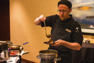 Chef Matt from Spencer's prepares a filet mignon with roasted garlic smashed potatoes, sautéed onions and a three herb demi-glace. Photo: Talyn Sherer
