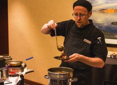Chef Matt from Spencer's prepares a filet mignon with roasted garlic smashed potatoes, sautéed onions and a three herb demi-glace. Photo: Talyn Sherer