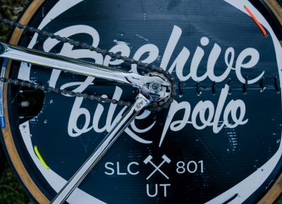The Beehive Bike Polo logo covering the spokes of the bike tire so the ball doesn’t get stuck. Photo: Jo Savage // @SavageDangerWolf