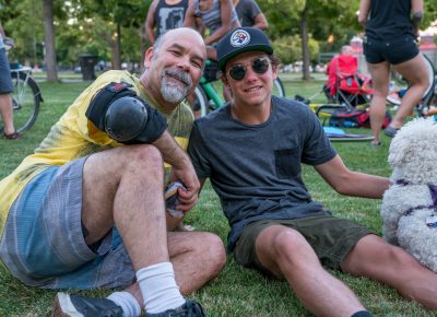 Dan Smith (left) heard about SLC bike polo in 1999 after seeing an ad in City Weekly about polo in Liberty Park. He linked with Chuck Heaton at this point, and the two still play polo together. Now Dan brings his son, Brandis, to the games. Photo: Jo Savage // @SavageDangerWolf