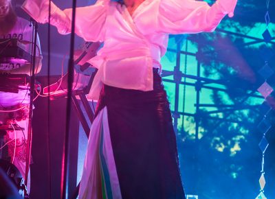 Yukimi Nagano embraces the red stage light. Photo: ColtonMarsalaPhotography.com